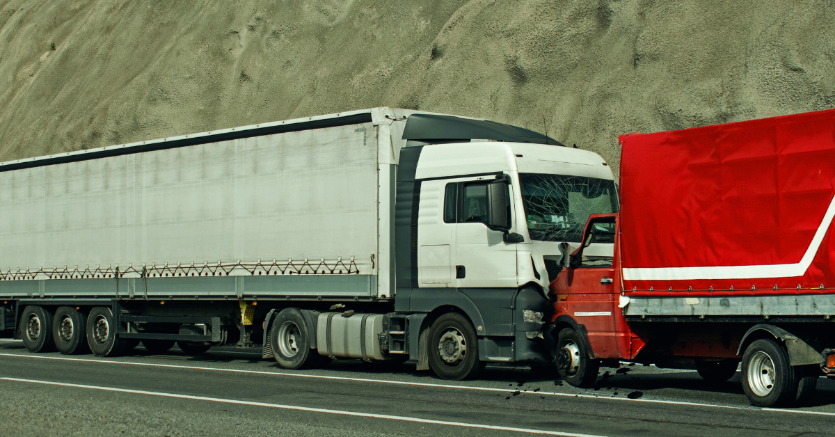18 wheeler crashing against a truck