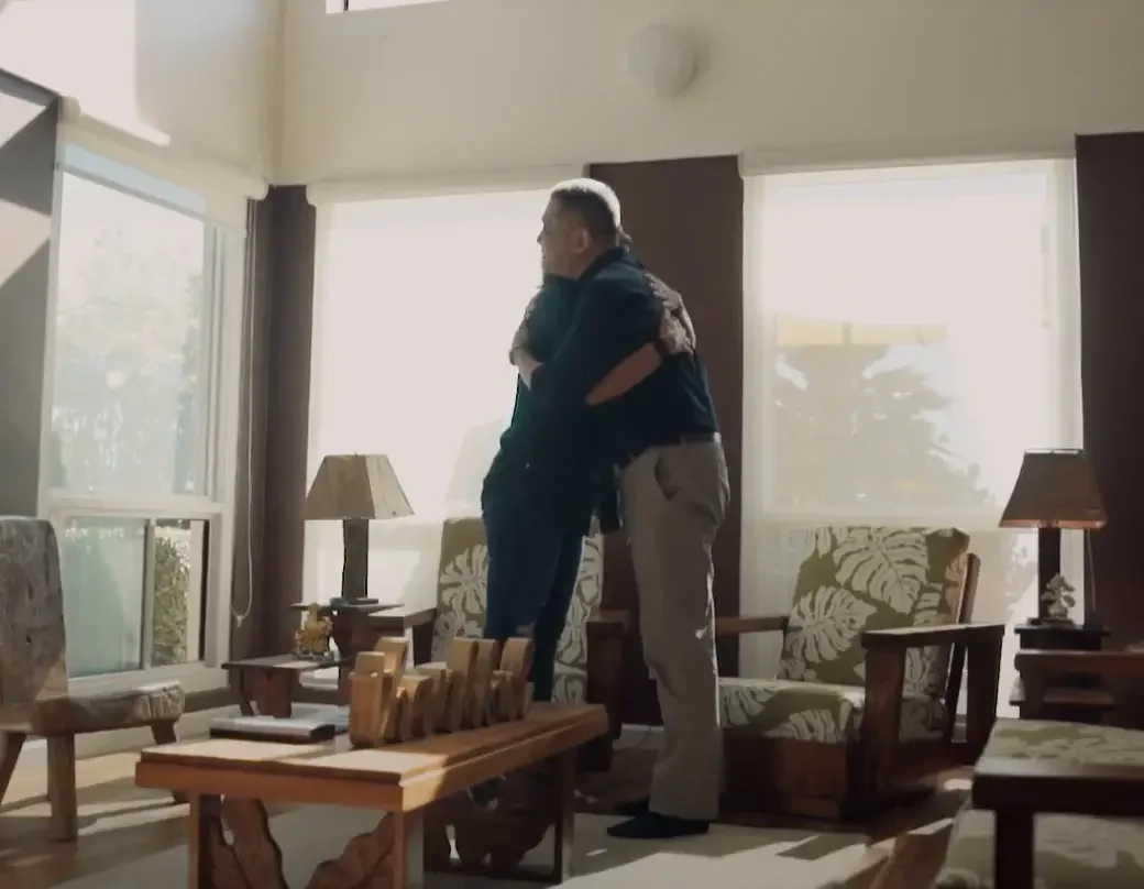 A person comforting someone